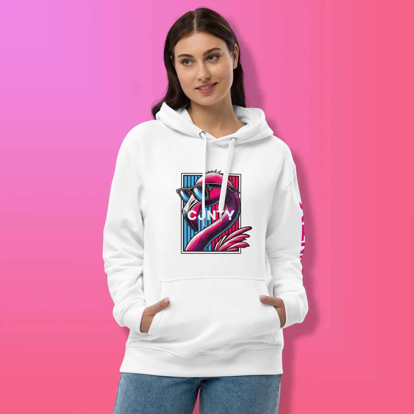 White Hoodie (Woman - Front View): A woman wearing a white hoodie with the Cunty flamingo design in bright tones and "Cunty" printed on the sleeve.